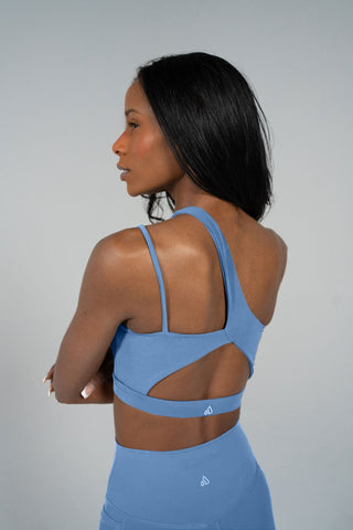 Alyth Active Serene Transform Asymmetical Sports Bra in Aero Blue - Women's Athletic Sports Bra Back View